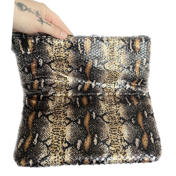 BCBGmaxazria White Glossy Sequined Styled Lazy Clutch in Animal Print Background - Picture 2 of 13